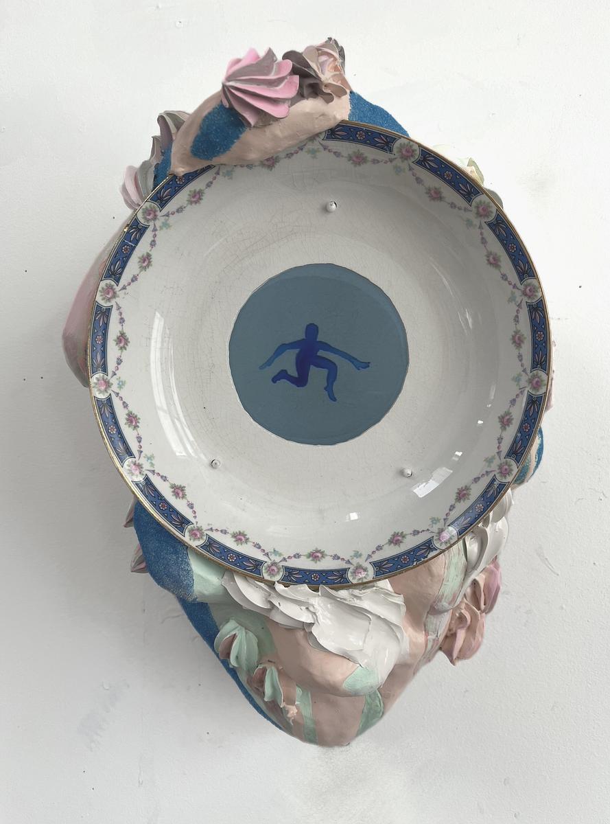 Treading Water, a sculpture made of dishes, paper mache and stop motion animation
